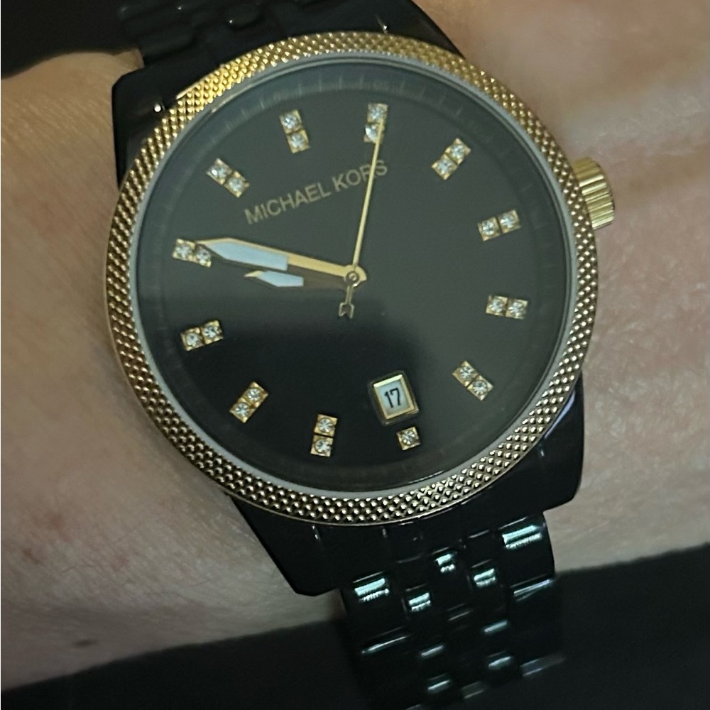 Michael Kors Black and Gold Smartwatch with Sleek Design